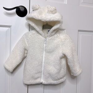 Baby girl Old Navy 6-12M cream faux fur jacket with bear ears on the hoodie.